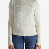 White pullover worn by a person, showing the pullover's fit