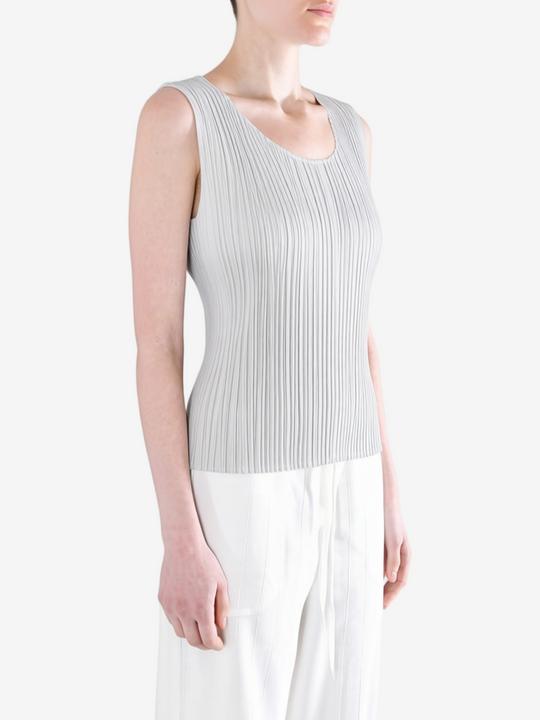 Grey shirt worn by a person, showing the shirt fit