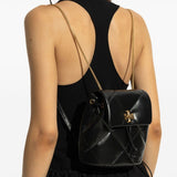 Black bag worn by a person, showing the bag’s fit