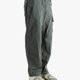 Gray cargo pants worn by a person, showing the pants fit