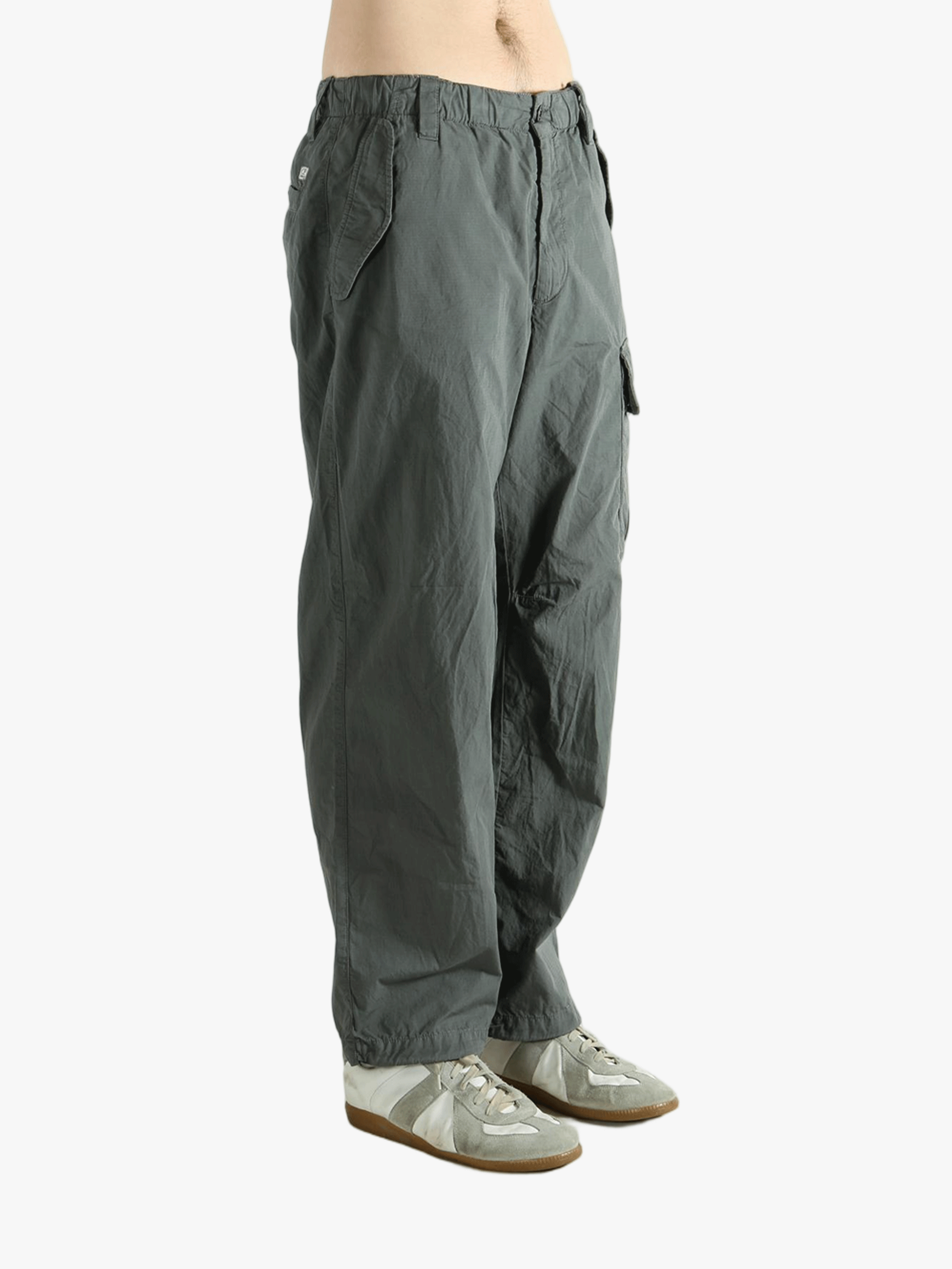 Gray cargo pants worn by a person, showing the pants fit