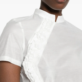 Close up of the white tops, showing  texture of the cotton