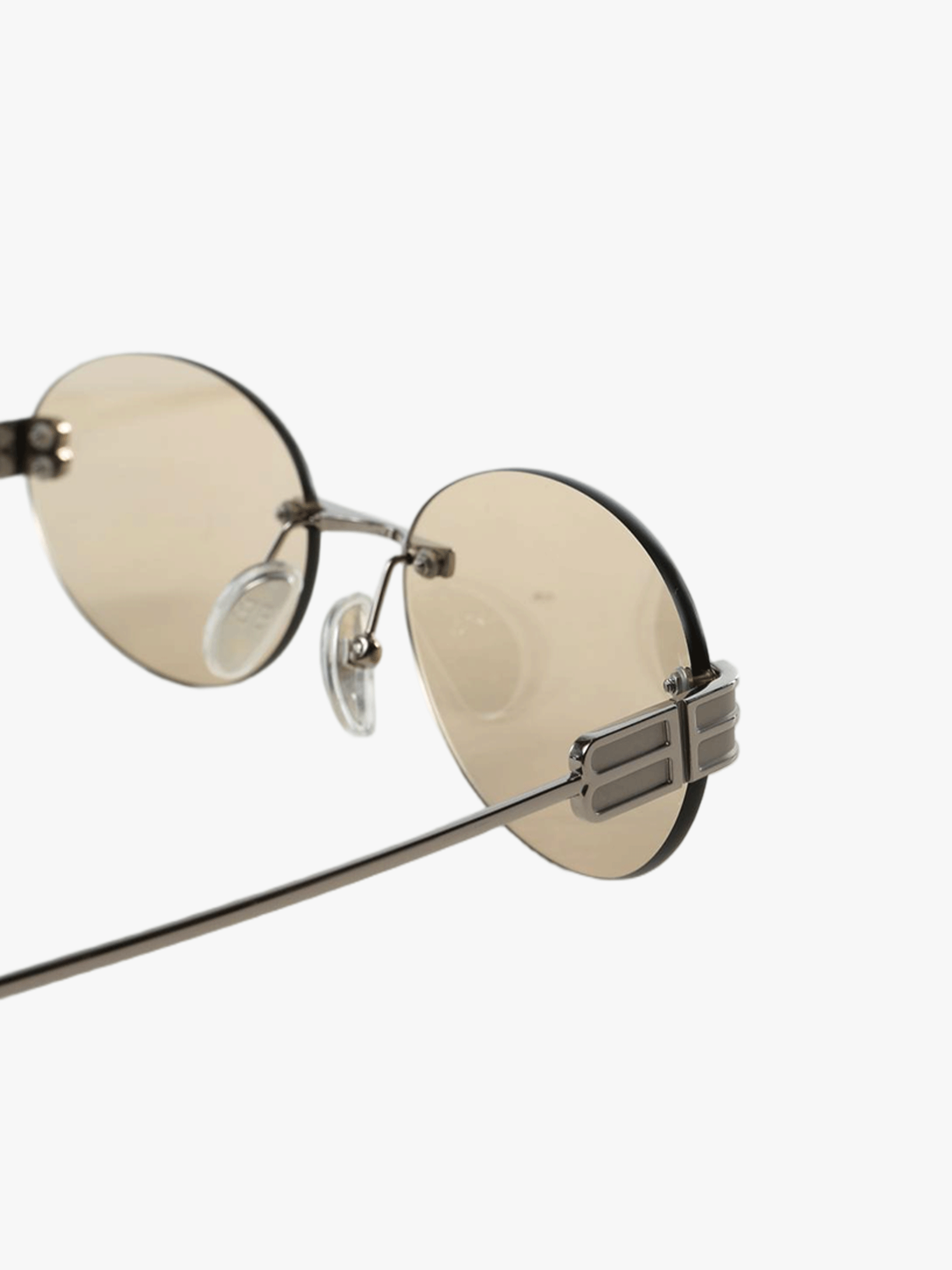 Close up of tan eyewear, showing texture of the UVA/UVB fabric