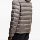 Grey jacket worn by a person, showing the jacket fit