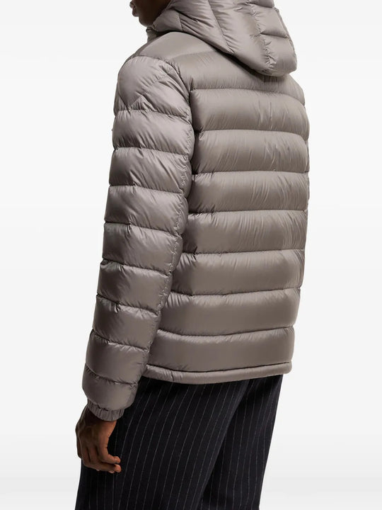 Grey jacket worn by a person, showing the jacket fit