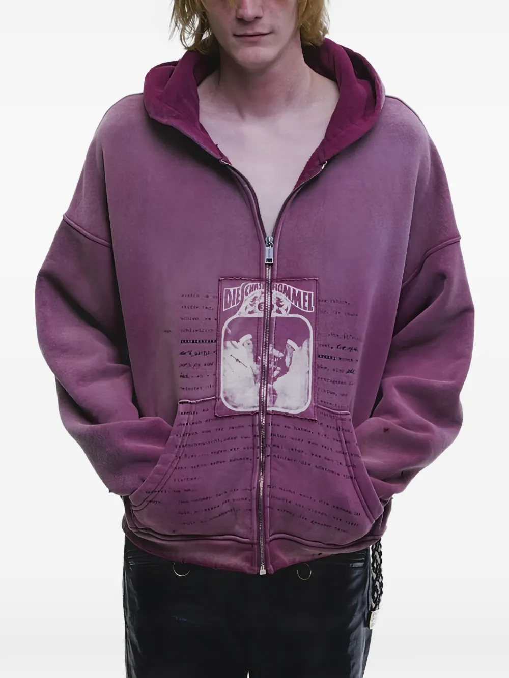 Purple hoodie worn by a person, showing the hoodie fit