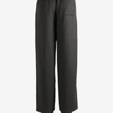 Brown pants worn by a person, showing the pants's fit