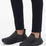 Close up of Black sneakers, showing texture of the rubber fabric
