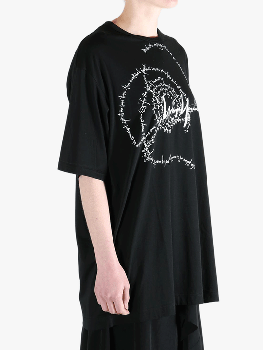 Black t-shirt worn by a person, showing the t-shirt's fit