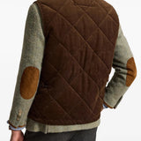 Brown jacket worn by a person, showing the jacket fit