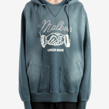 Navy hoodie worn by a person, showing the hoodie fit