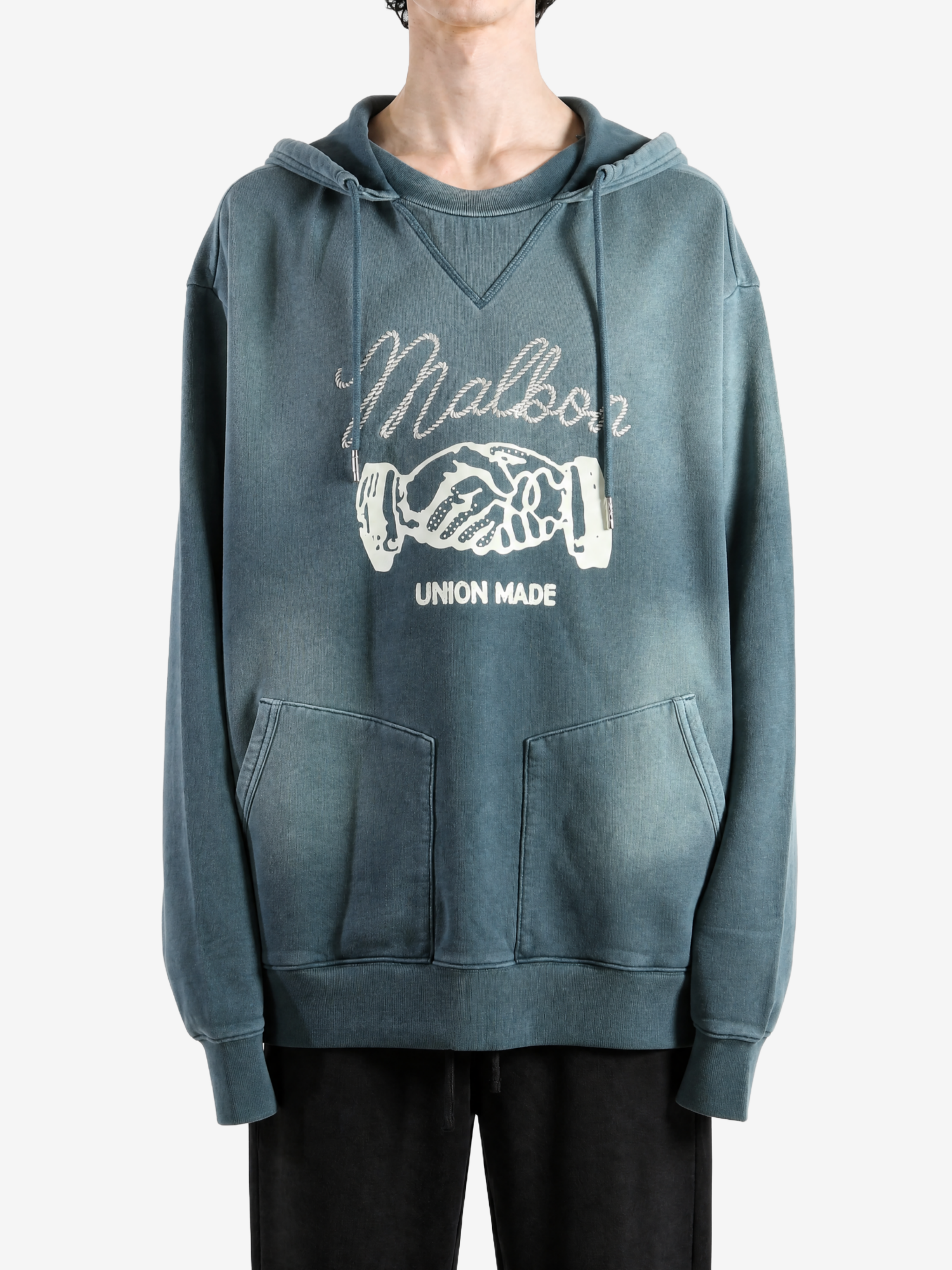 Navy hoodie worn by a person, showing the hoodie fit