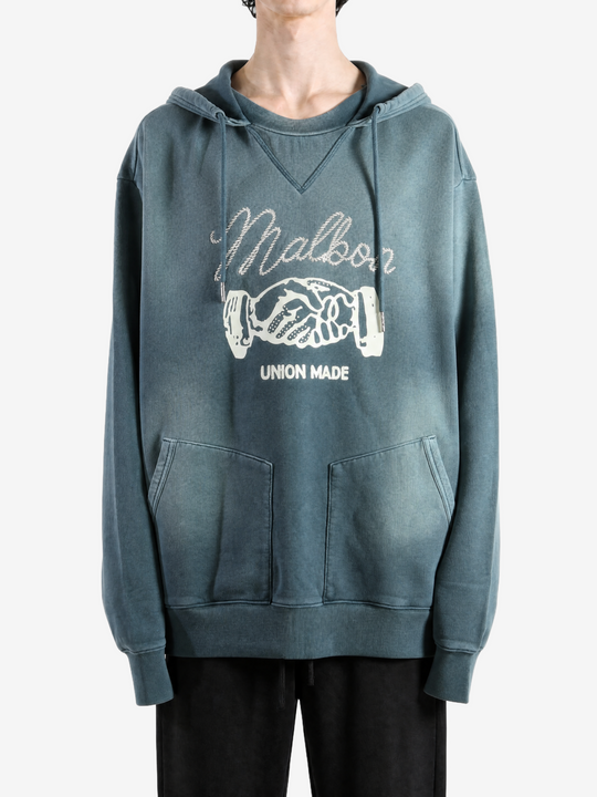 Navy hoodie worn by a person, showing the hoodie fit