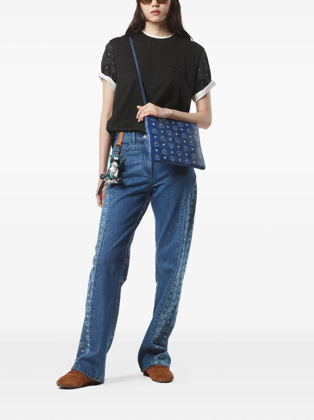 Blue bag worn by a person, showing the bag's fit