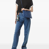 Blue bag worn by a person, showing the bag's fit