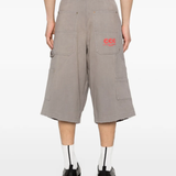 Grey shorts worn by a person, showing the shorts' fit