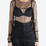 Black top worn by a person, showing the top's fit