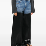 blue jeans worn by a person, showing the jeans fit