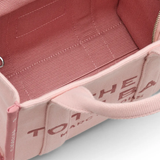 Close up of the pink bag, showing texture of the cotton fabric