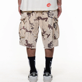 Brown shorts worn by a person, showing the shorts fit