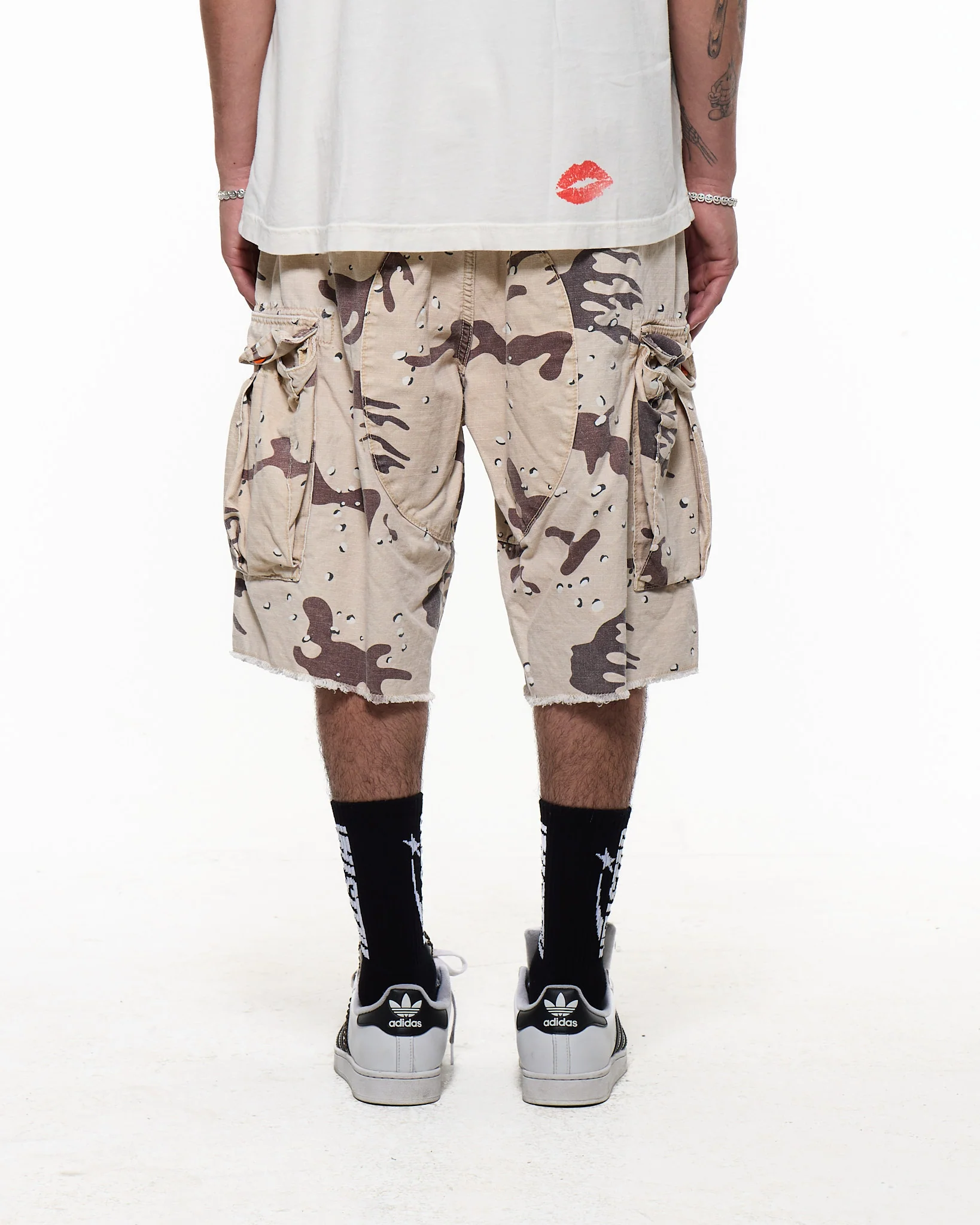 Brown shorts worn by a person, showing the shorts fit