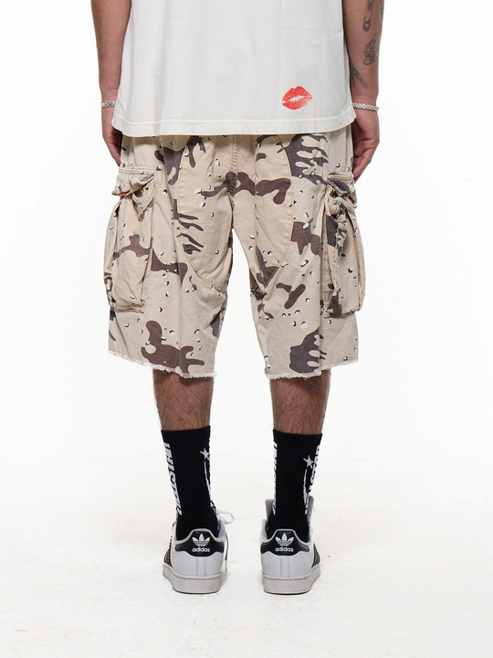 Brown shorts worn by a person, showing the shorts fit