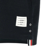 Close up of Navy t-shirt, showing texture of the 55% cotton/ 36% linen/ 7% polyamide/ 2% elastane fabric