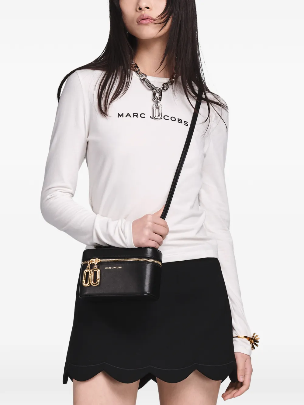 Black bag worn by a person, showing the bag fit