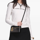 Black bag worn by a person, showing the bag fit