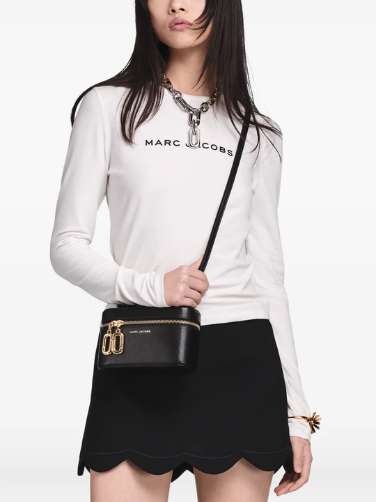 Black bag worn by a person, showing the bag fit