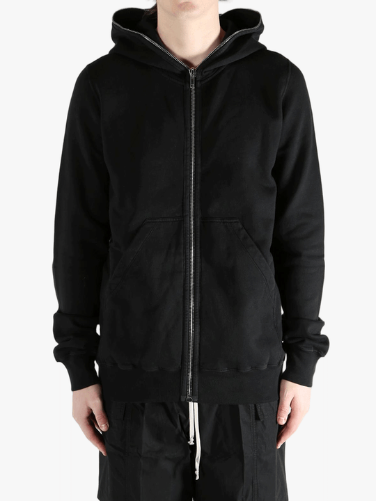Black hoodie worn by a person, showing the hoodie fit