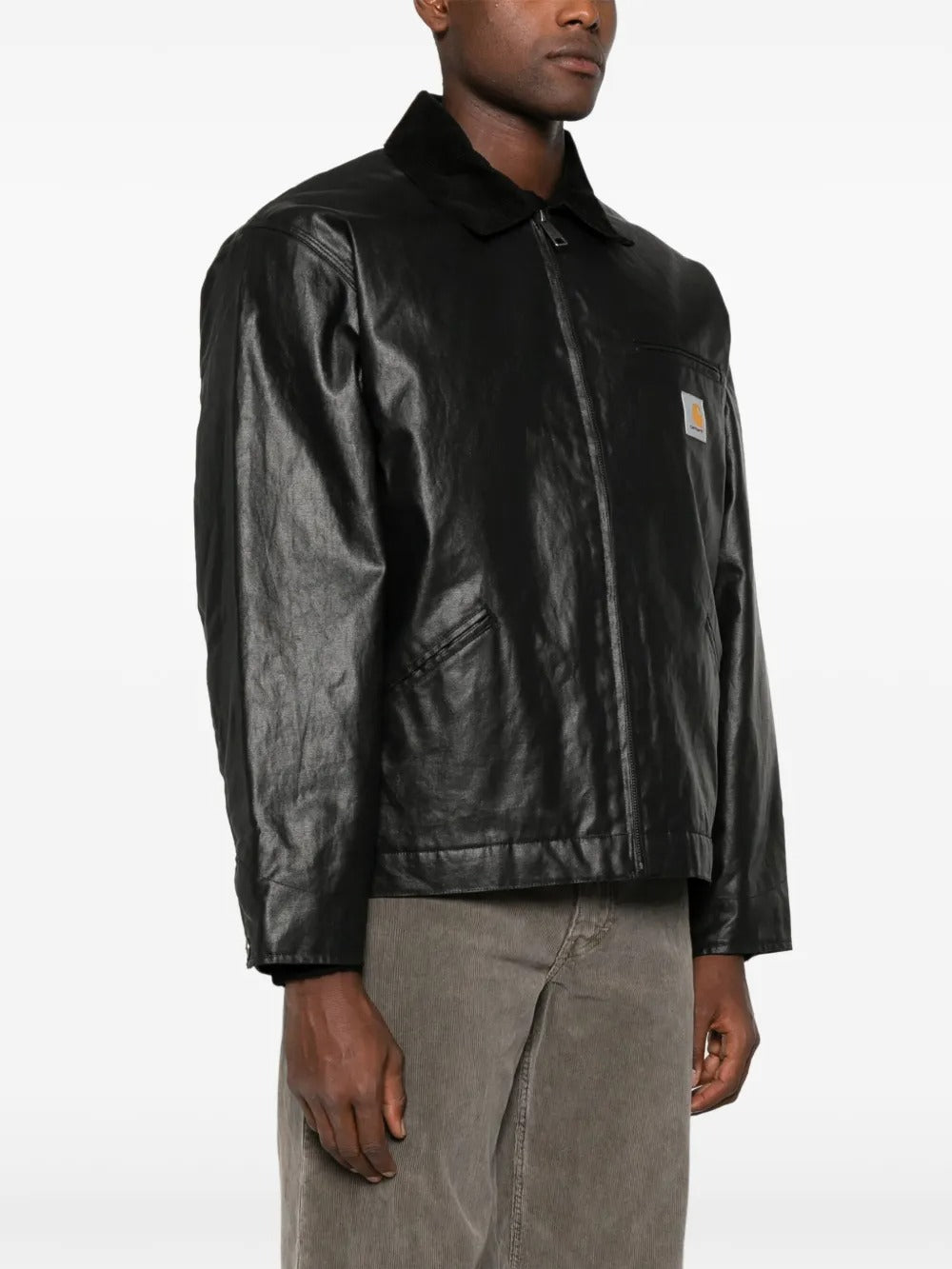 Black jackets worn by a person, showing the jackets fit