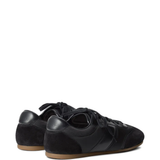 Black sneakers, side view