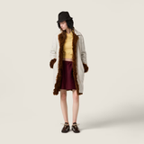 Yellow knitwear, full body view