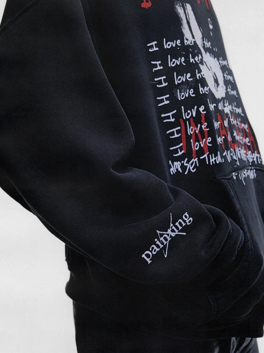 Black hoodie worn by a person, showing the hoodie fit
