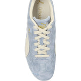 Blue sneaker, side view