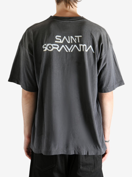 Black t-shirt worn by a person, showing the t-shirt's fit