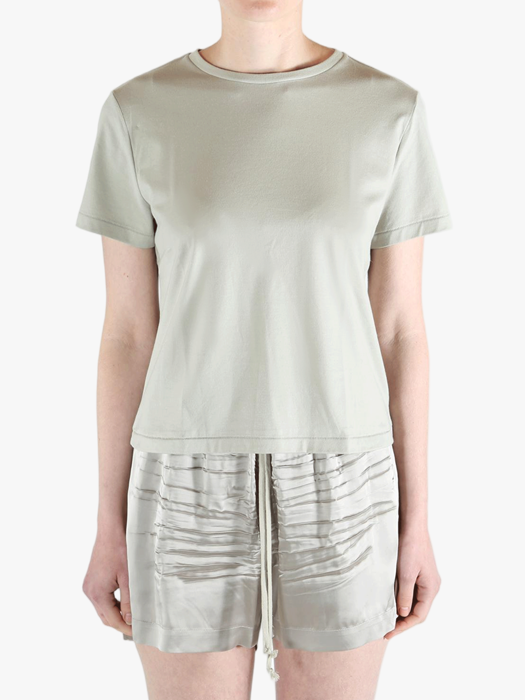 Grey t-shirt worn by a person, showing the shirt's fit