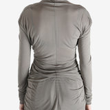 Grey t-shirt worn by a person, showing the t-shirt's fit