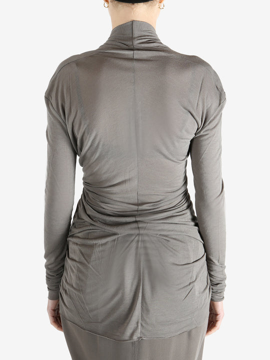 Grey t-shirt worn by a person, showing the t-shirt's fit