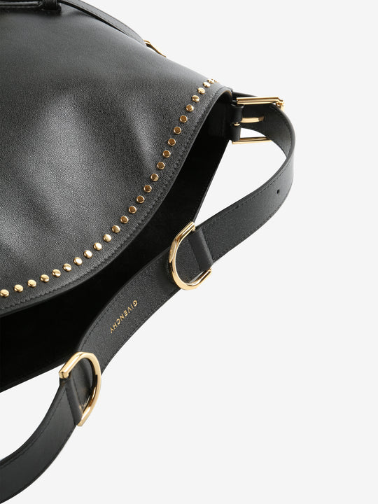 Close up of black bags, showing texture of the calf leather fabric
