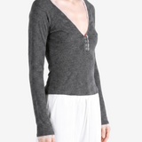 Grey top worn by a person, showing the top fit
