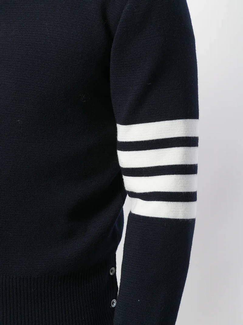 Close up of navy knit, showing texture of the wool fabric