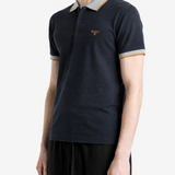 Navy shirt worn by a person, showing the shirt fit