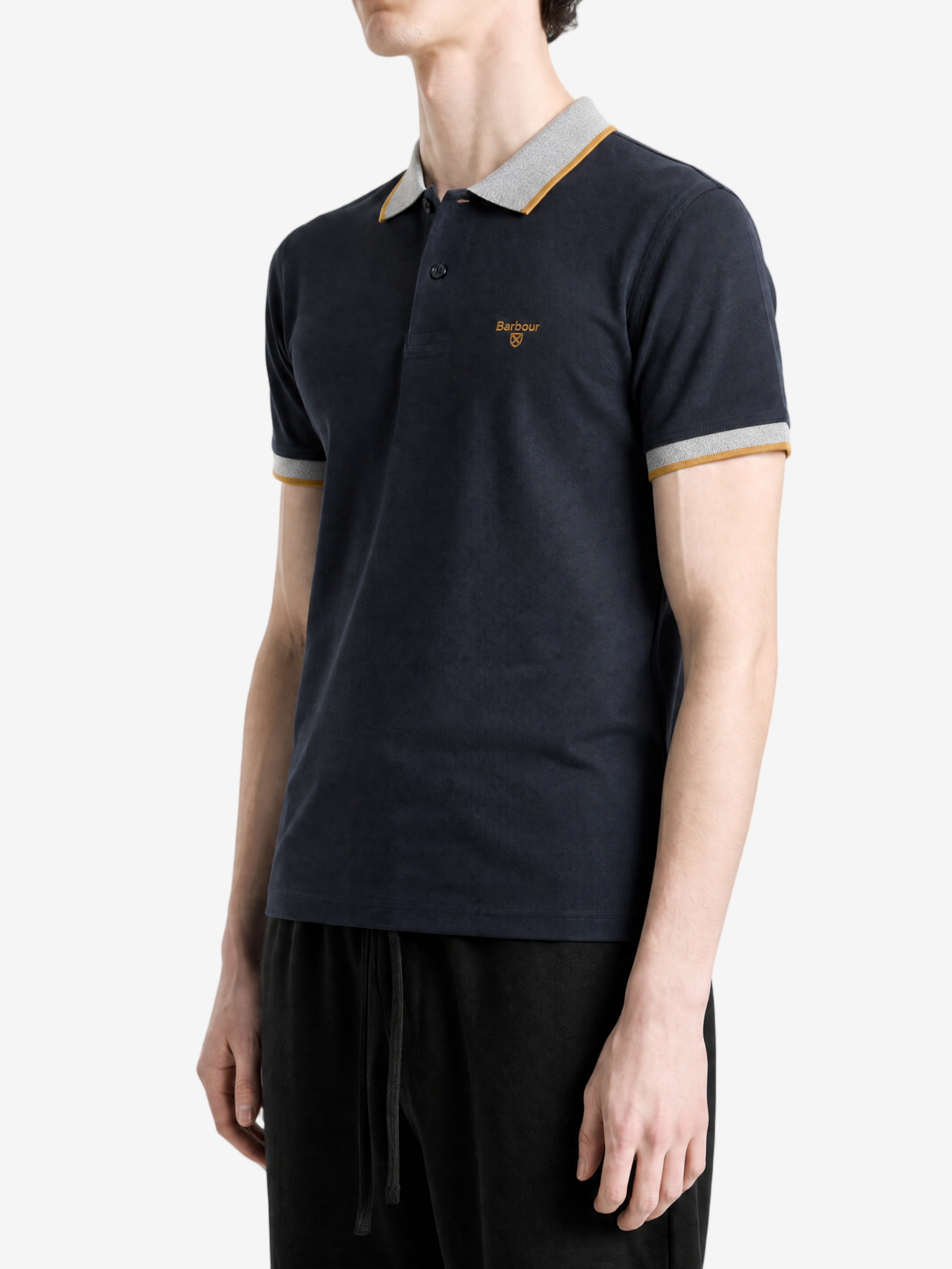 Navy shirt worn by a person, showing the shirt fit
