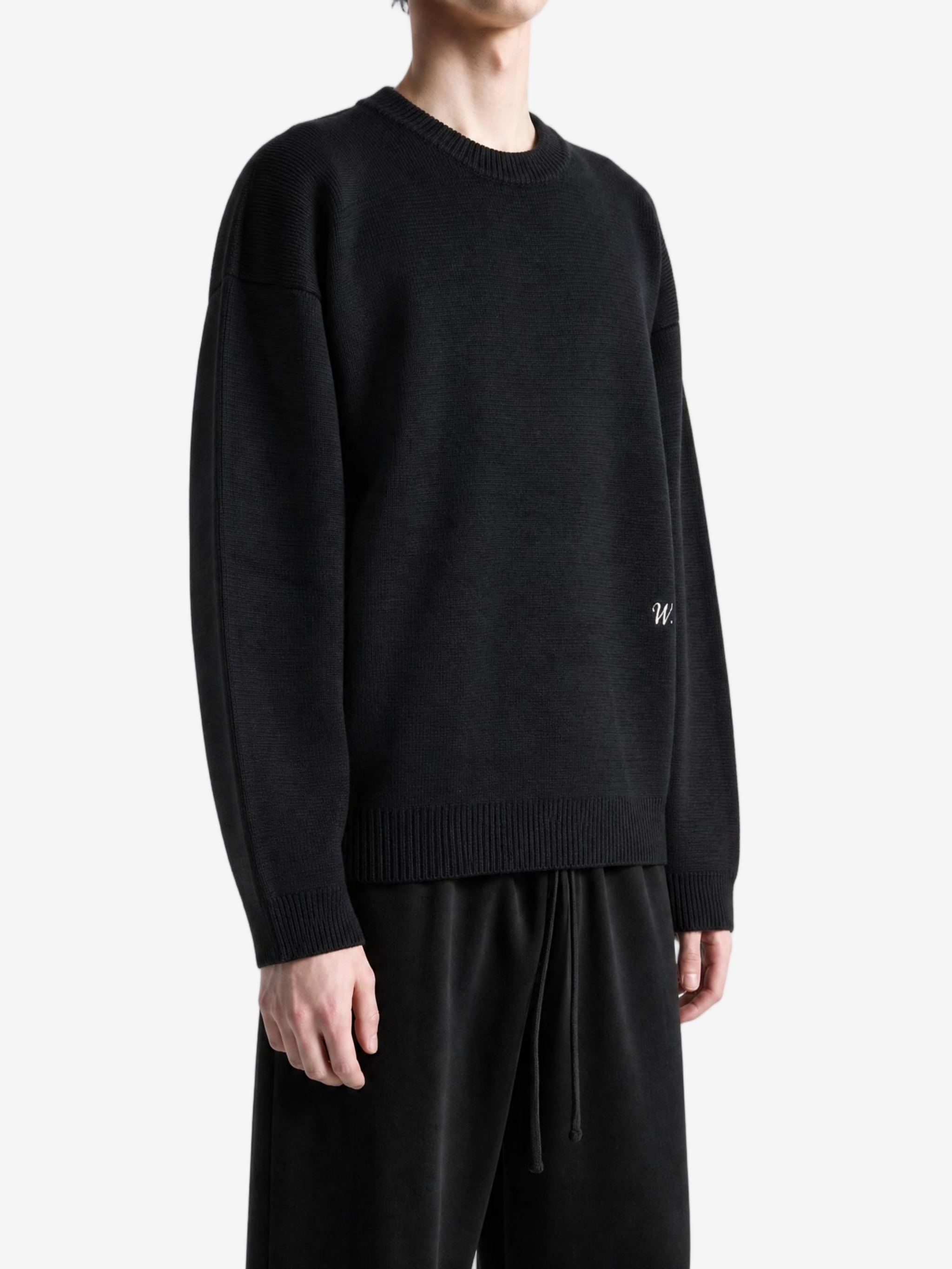 Black knitwear, full body view