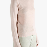 Pink sweater, side view