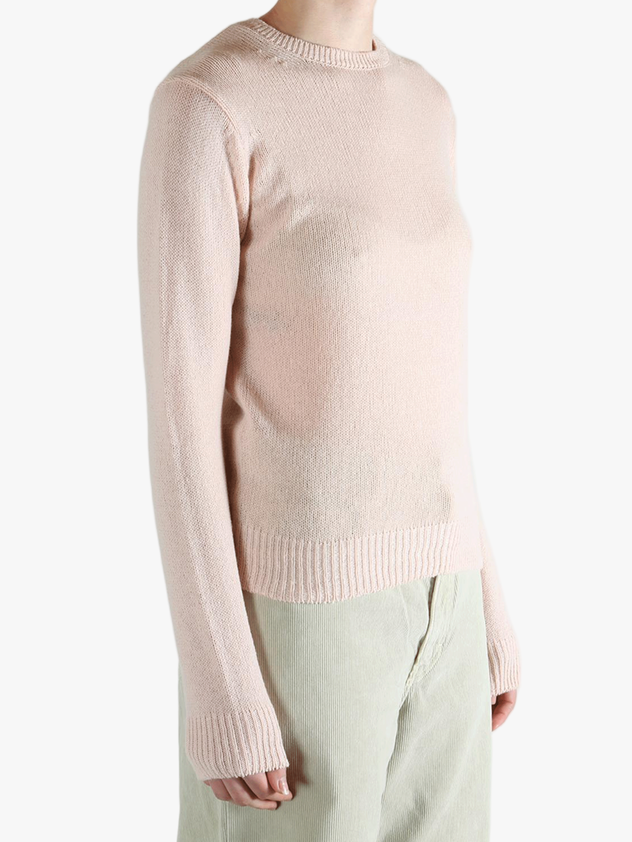 Pink sweater, side view