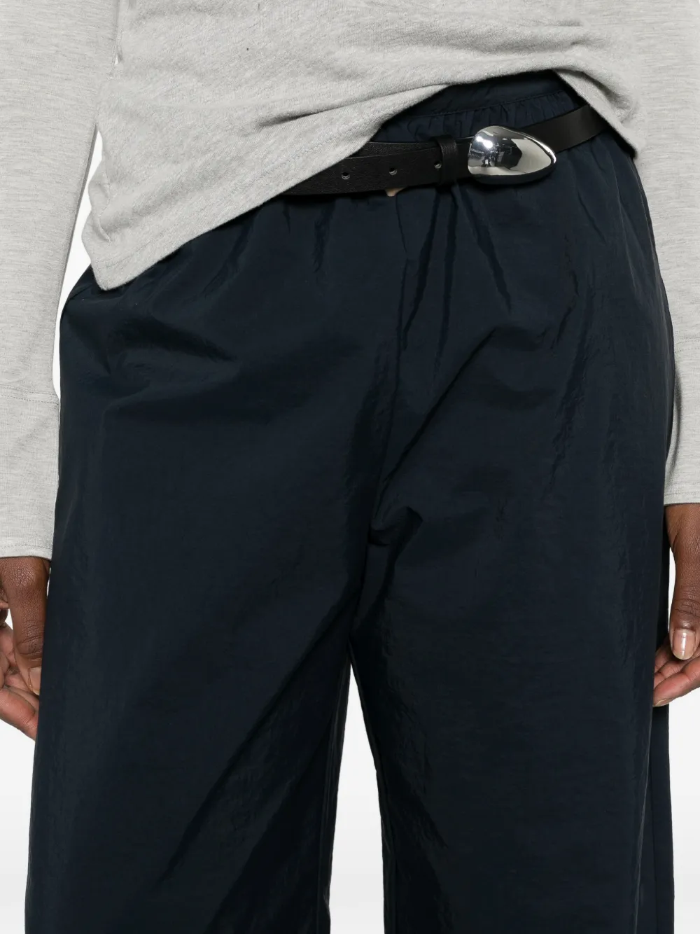 Close up of the blue pants, showing texture of the recycled polyamide