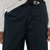 Close up of the blue pants, showing texture of the recycled polyamide